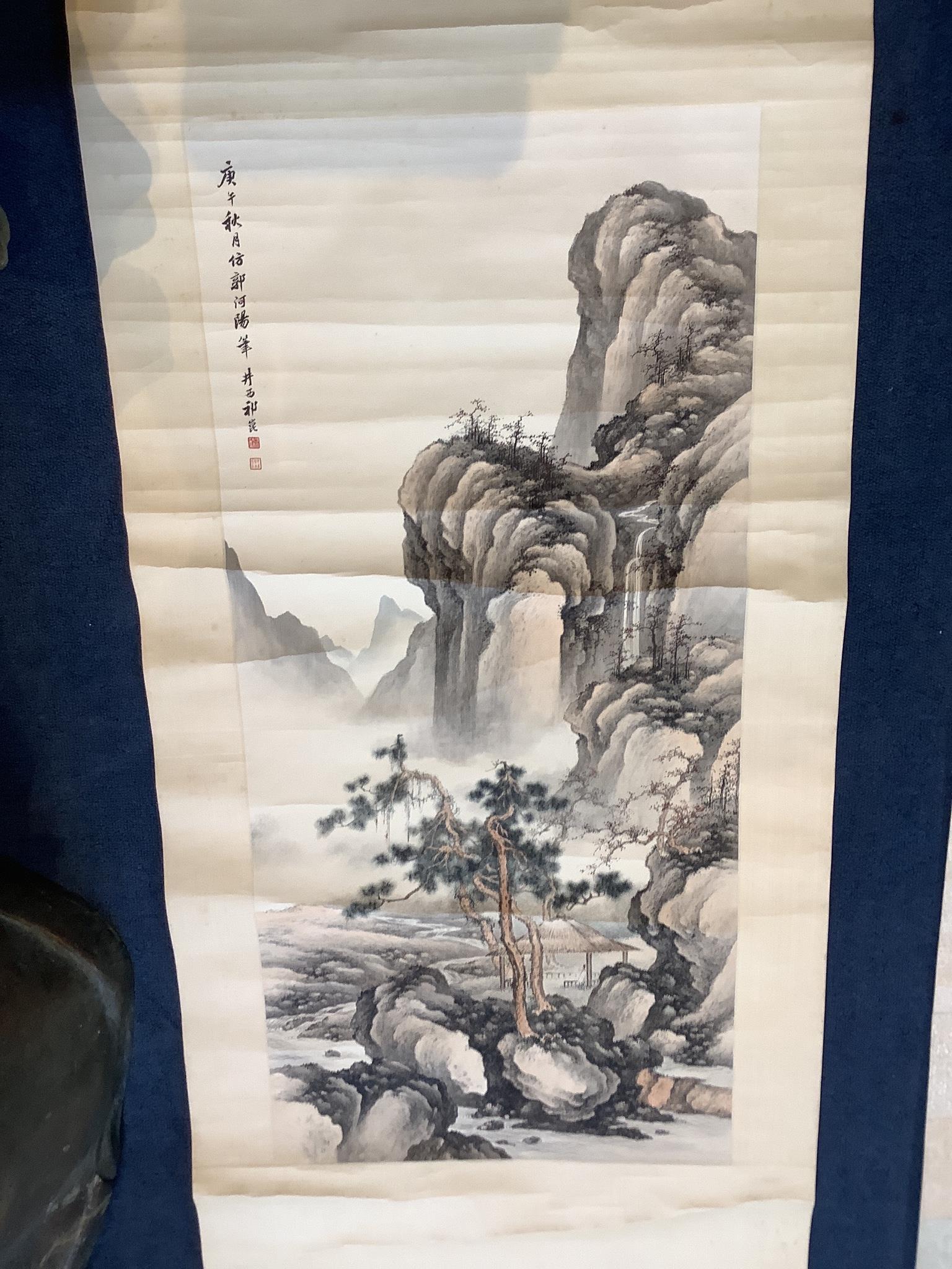 A Chinese scroll painting of a scholar seated in a mountainous river landscape, 20th century Image 94 cm X 45 cm